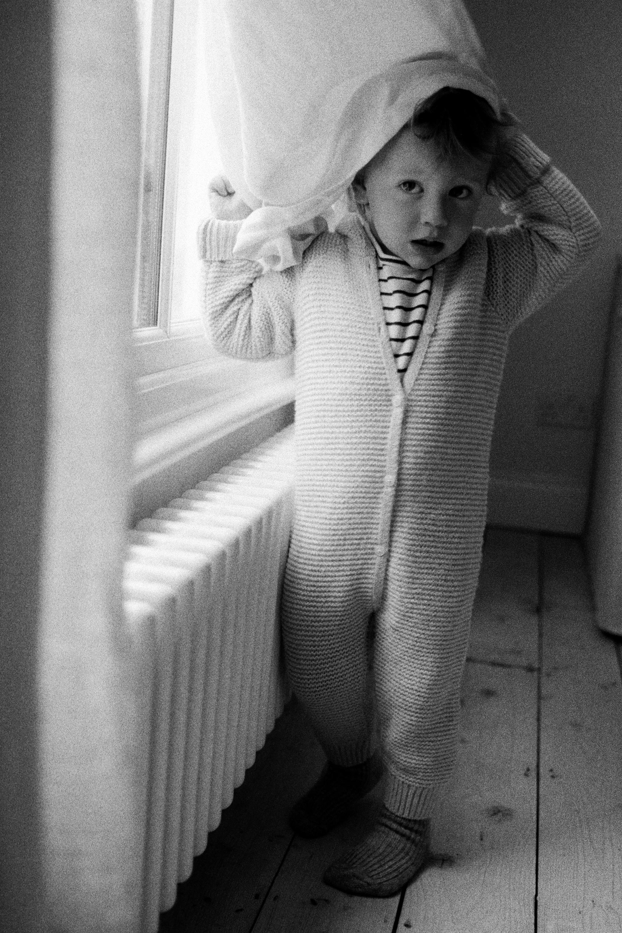 COMBINAISON LONGUE EN MAILLE ÉPAISSE À CAPUCHE